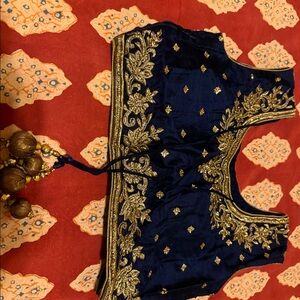 Indian lehenga (skirt) and blouse with scarf.